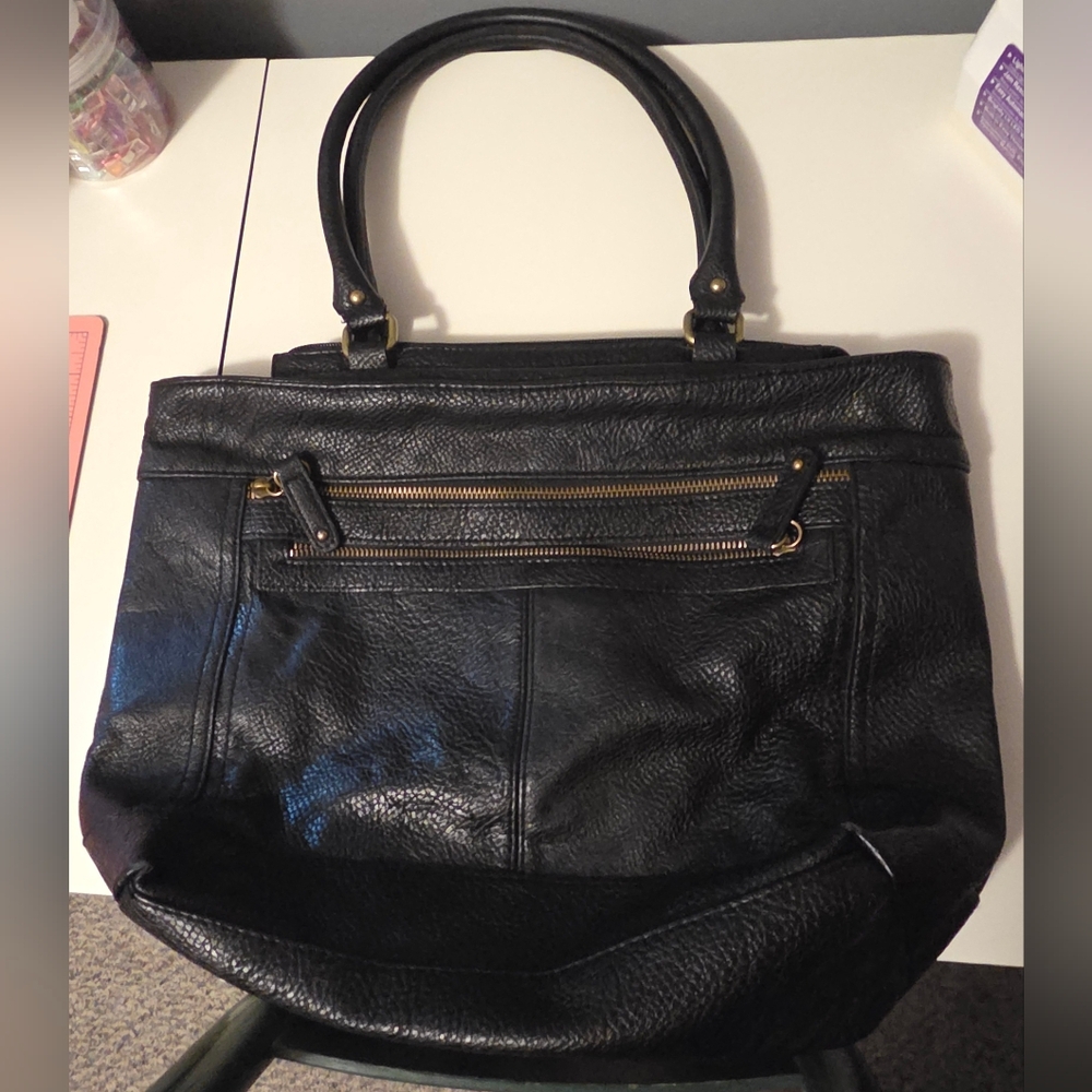 Merona Black handbag with Sleek Design and Metal Hardware